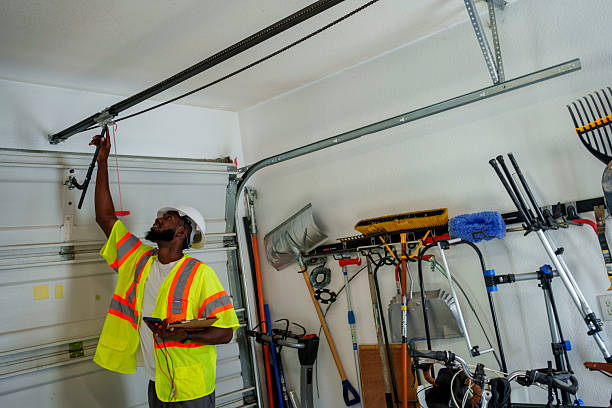 Professional Garage Door technician working in Bloomfield, IN
